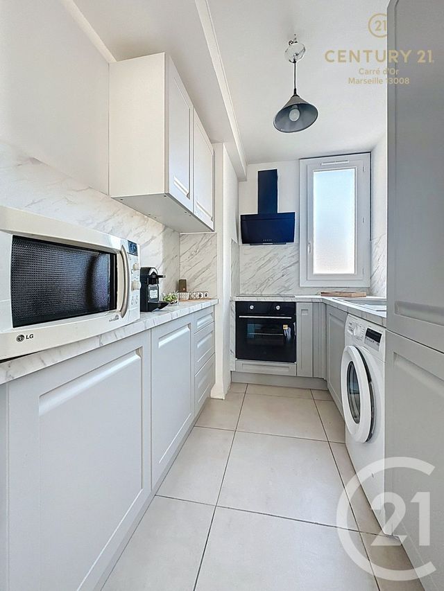 Appartement F3 à vendre - 3 pièces - 57.4 m2 - MARSEILLE - 13008 - PROVENCE-ALPES-COTE-D-AZUR - Century 21 Carré D'Or